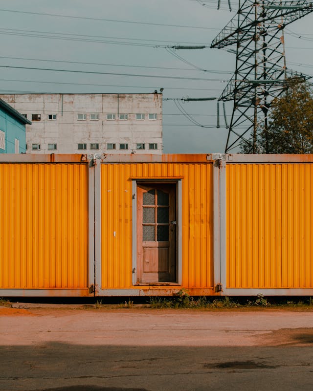 modified shipping container with door and window